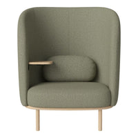 Green upholstered armchair with a textured pattern and minimalist wooden armrest, creating a modern, inviting look.