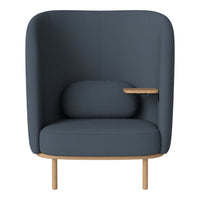 Stylish dark blue upholstered chair with smooth, rounded edges and a natural wood base. Ideal for modern decor.