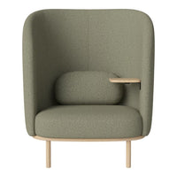 Green upholstered armchair with a textured pattern, featuring a rounded back and natural wood accents.