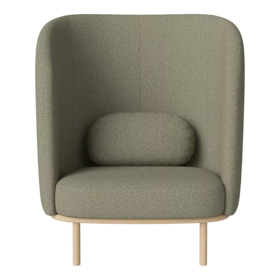 Green upholstered armchair with a modern textural pattern and light wooden legs, featuring a rounded lumbar cushion.