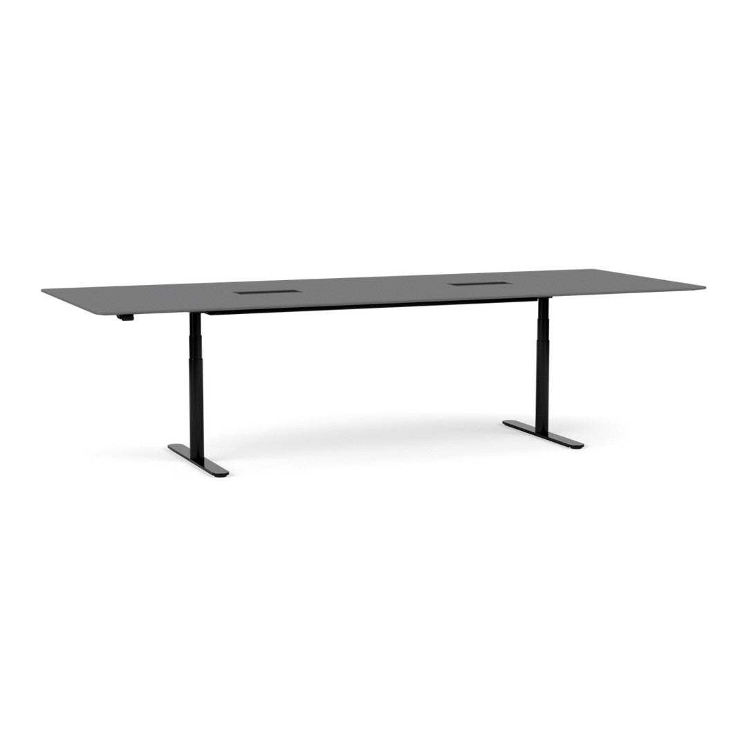 Sleek black rectangular table with a smooth surface and modern metal legs, ideal for contemporary workspace aesthetics.