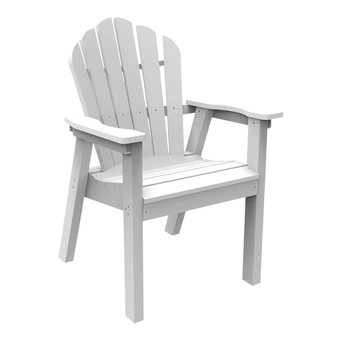 White Adirondack chair featuring a classic slatted design and curved backrest, perfect for outdoor relaxation.