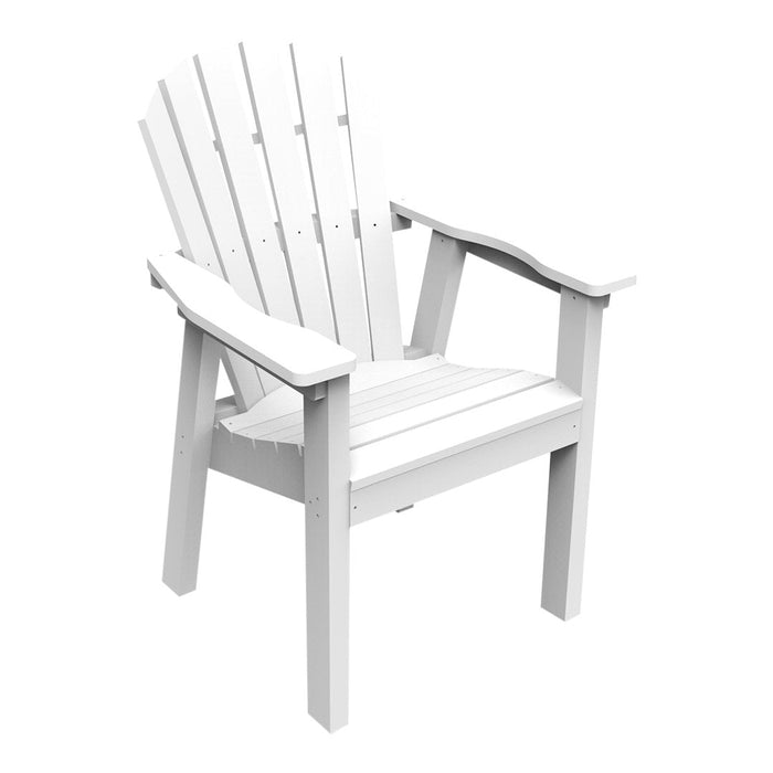 White Adirondack chair with slatted back and wide armrests, perfect for outdoor relaxation and modern decor.