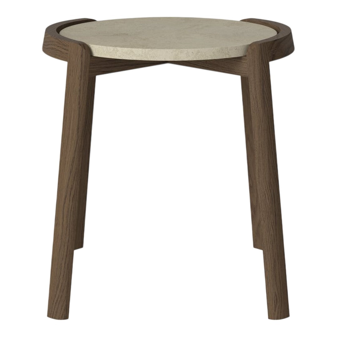Round stone top side table with dark wood legs, featuring a minimalist design and smooth finishes.