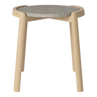 Light wooden legs with a round gray concrete top, featuring a smooth, minimalist design.