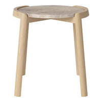 Light wood stool with a smooth, round, beige stone top and minimalist design. Perfect for modern decor.