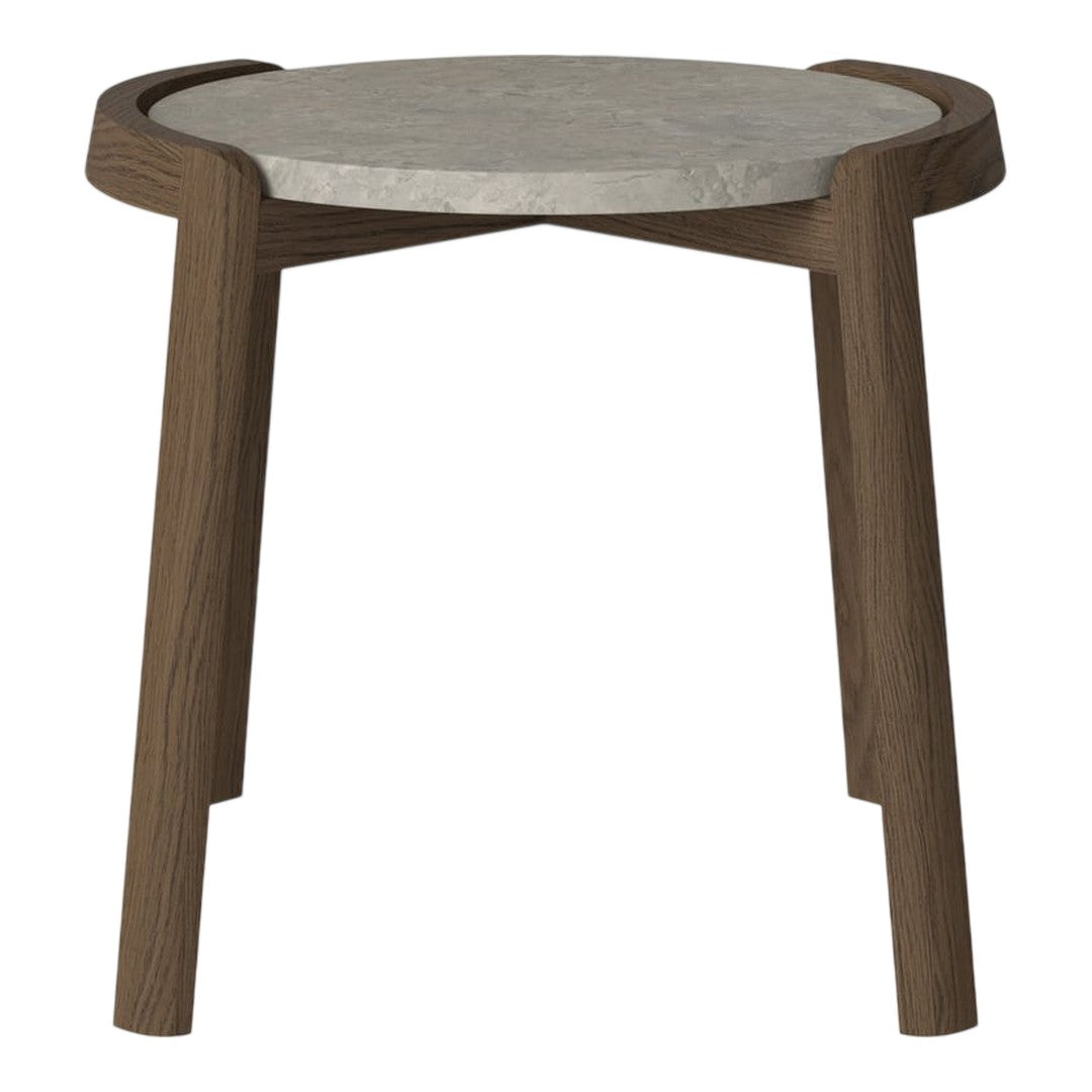 Round side table with a concrete top and dark wood legs, showcasing a modern, minimalist design.