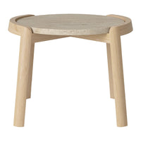Light wood side table with a smooth, round top and natural finish, featuring subtle texture and minimalistic design.