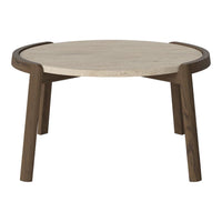 Round coffee table with a light beige top and dark wood legs, featuring a smooth, minimalistic design.