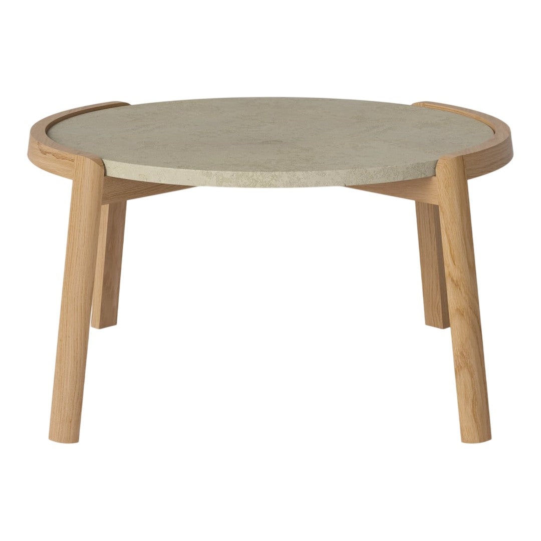 Light wooden legs support a round, textured stone tabletop in neutral tones, perfect for modern decor.