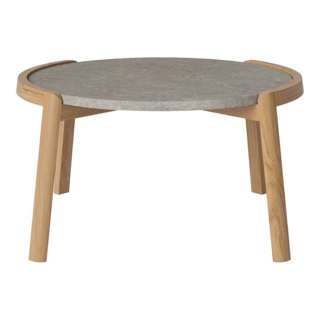 Round coffee table with a gray stone top and natural wood legs, featuring a smooth finish and minimalist design.