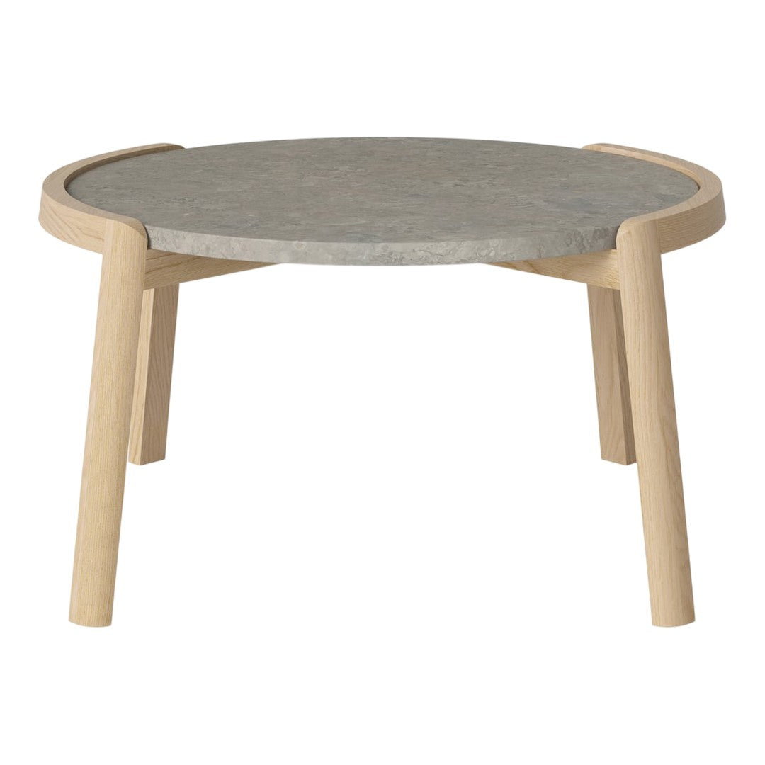 Round coffee table with a gray top and natural wood legs, featuring a minimalist design and smooth finish.