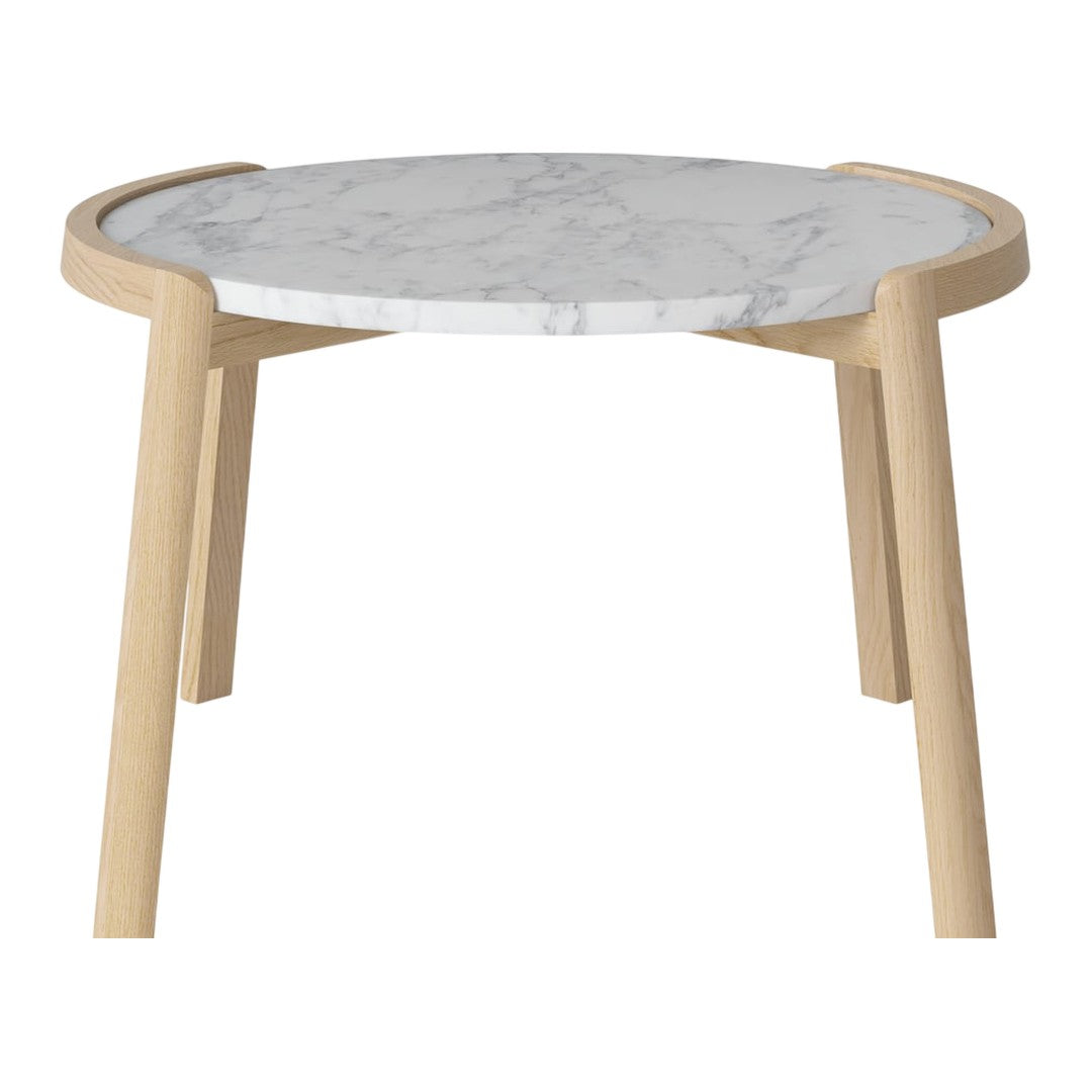 Round table with a white marble top and natural wood legs, featuring a sleek and minimalist design.