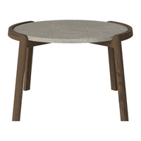 Round coffee table with a light gray stone top and warm brown wooden legs. Modern design with natural colors and clean lines.
