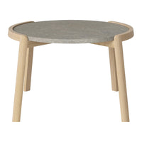Light wood frame with a round gray stone top. Modern design, perfect for minimalist decor.