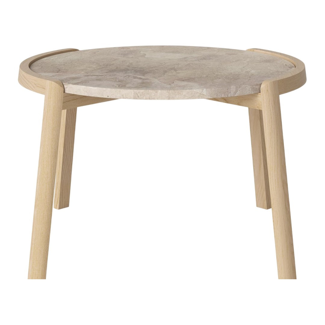 Round beige stone tabletop with light wooden legs, featuring a smooth, natural finish and subtle texture.