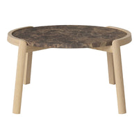 Round coffee table with a dark wood grain top and light wooden legs, featuring a smooth, modern design.