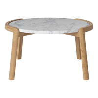 Round coffee table with a white marble top and natural wooden legs. Modern design featuring smooth textures and neutral tones.