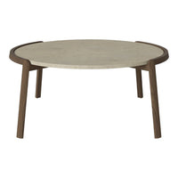 Round coffee table with a beige stone top and dark brown wooden legs, featuring a modern, minimalist design.
