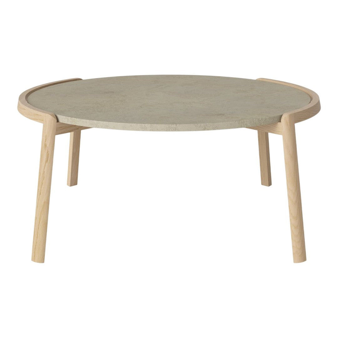 Round coffee table with a light wood frame and a textured grey stone top, showcasing a minimalist design.