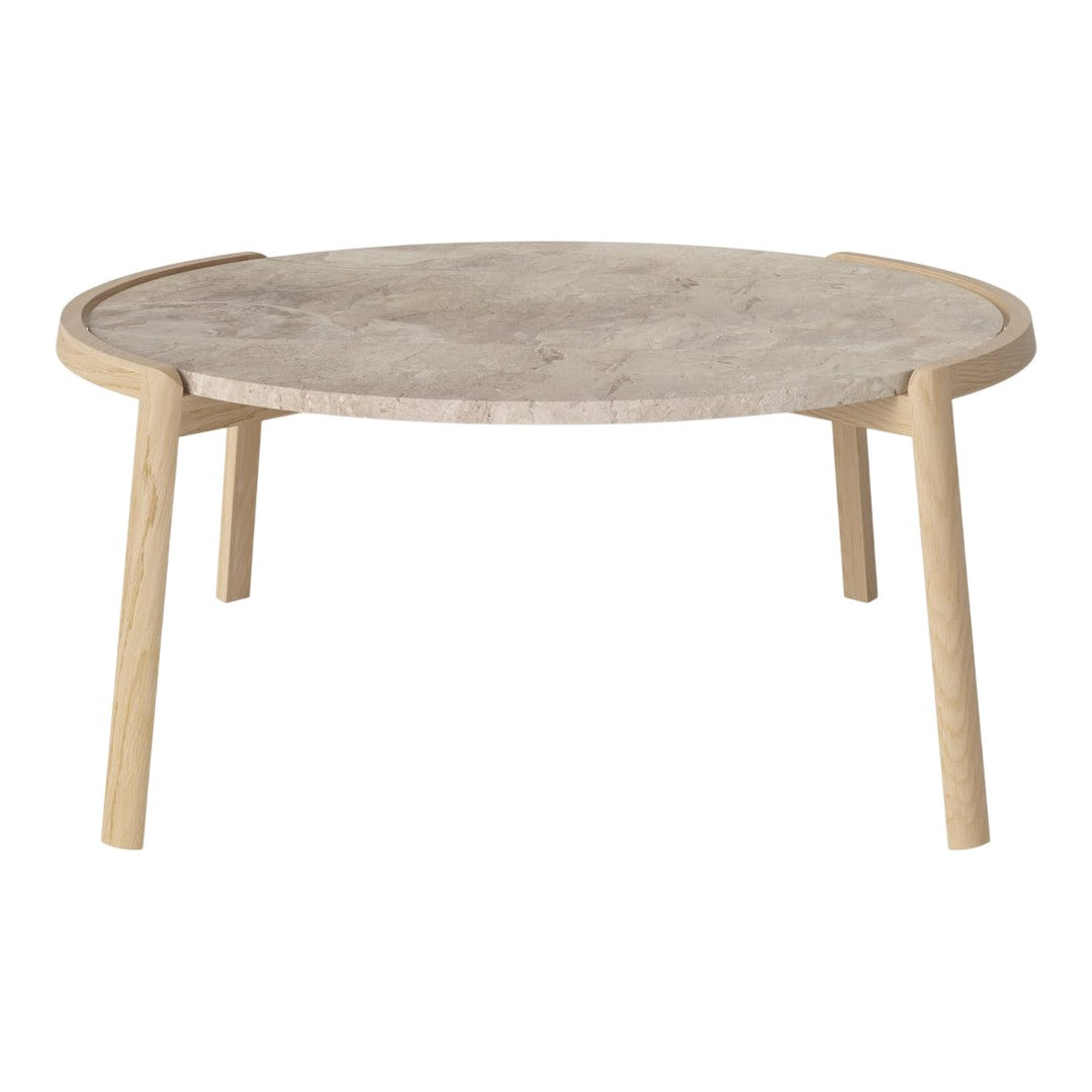 Round wooden coffee table with a light beige textured top and natural wood legs, featuring a simple, minimalist design.