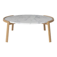 Round coffee table with a white marble top and natural wood legs, featuring a sleek and modern design.