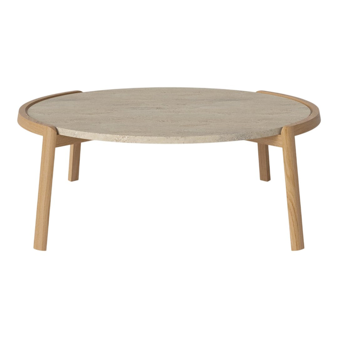 Round coffee table with a light wood finish and a textured cream tabletop, featuring minimalist design and natural colors.