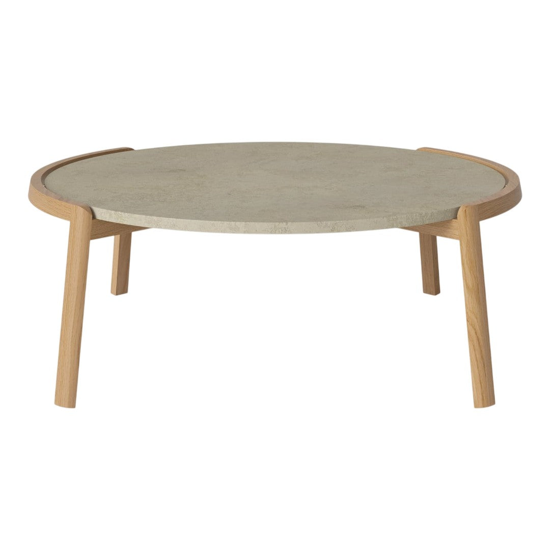 Gray circular tabletop with a smooth finish and natural wood legs, creating a minimalist and modern look.