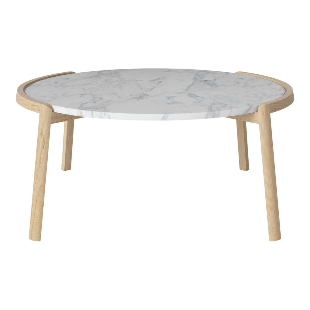 Round coffee table featuring a white marble top with gray veining and natural wood legs, adding modern elegance.