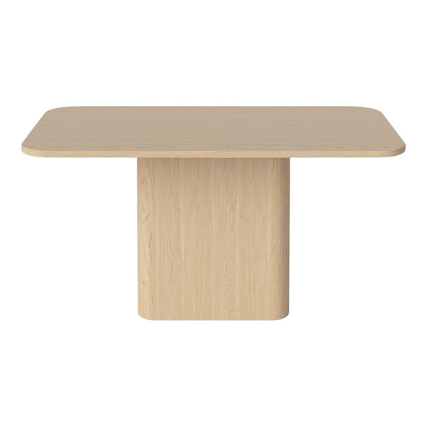 Light wood dining table with a smooth, natural finish and clean lines, perfect for modern decor.