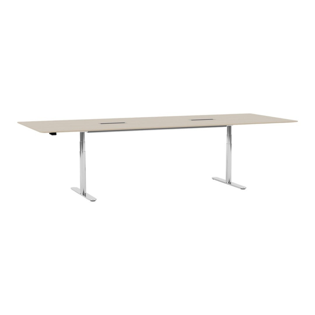 Rectangular table with a light beige surface and sleek chrome legs; minimalist design with a smooth, solid finish.