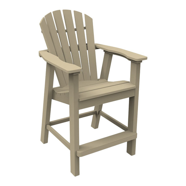 Light beige outdoor Adirondack bar chair with slatted backrest and sturdy armrests. Perfect for patios.