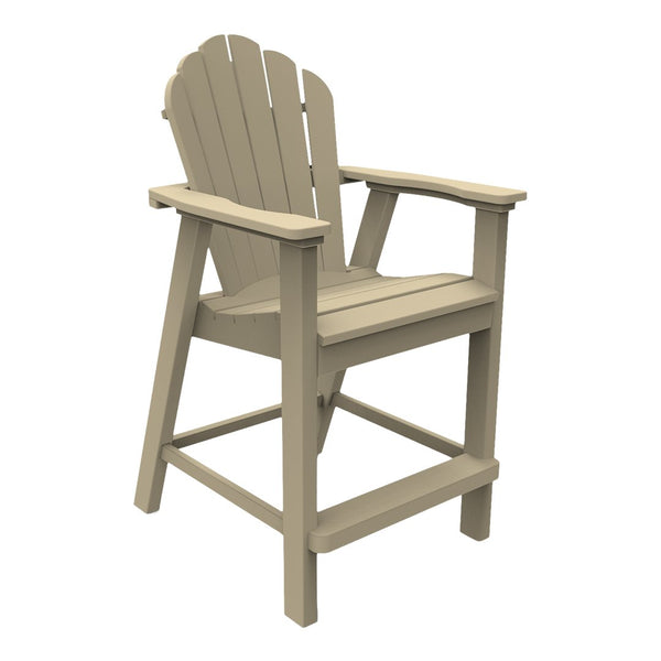 Beige Adirondack chair with a slatted back and wide armrests, perfect for outdoor patios and decks.