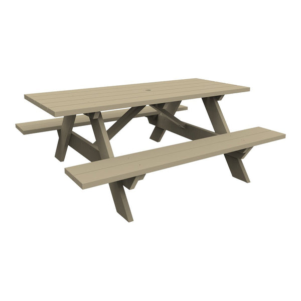 Sage green rectangular picnic table with a slatted design and sturdy A-frame legs. Perfect for outdoor dining.