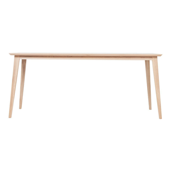 Light wood dining table with a smooth, white tabletop and clean, minimalist design. Ideal for modern interiors.