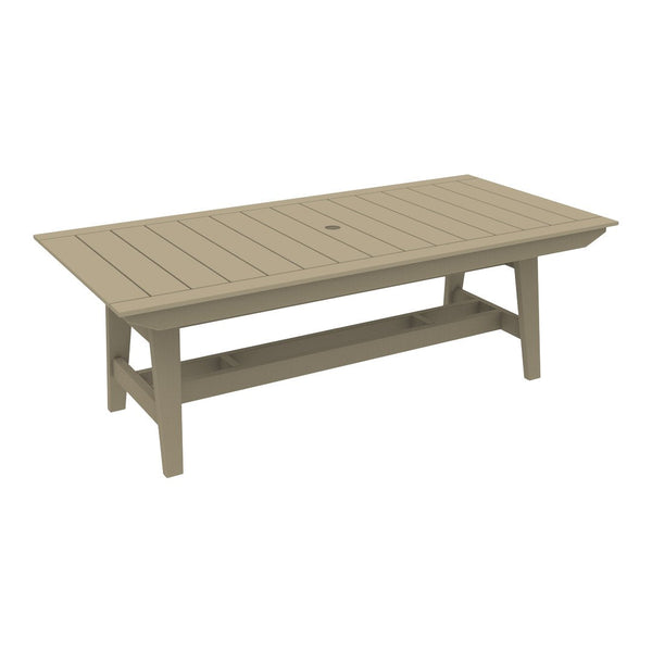 "Rectangular outdoor table in a soft beige color with a slatted pattern and umbrella hole."