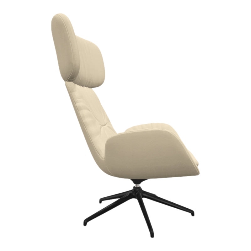 Cream-colored lounge chair with a sleek design and black base, featuring subtle tufted patterns.