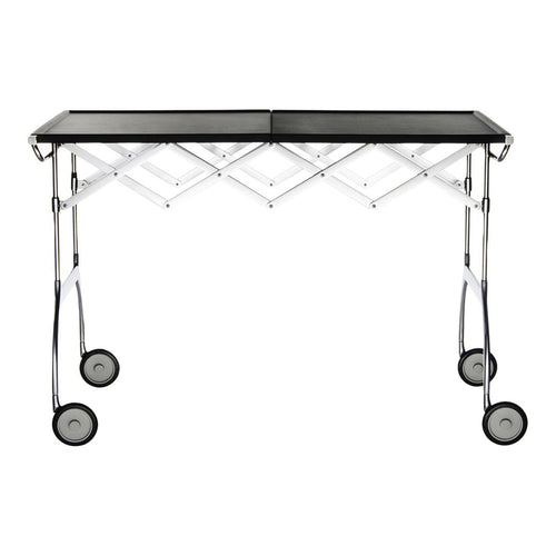 "Black and silver collapsible table with a geometric pattern and chrome wheels, perfect for versatile setups."