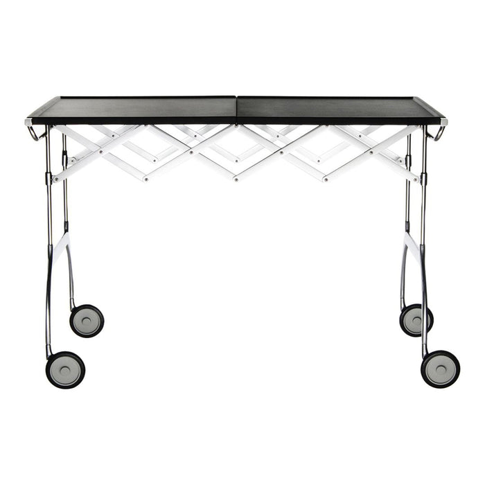 "Black and silver collapsible table with a geometric pattern and chrome wheels, perfect for versatile setups."