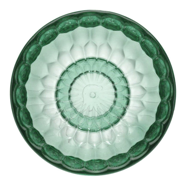 Green glass plate featuring a textured, geometric floral pattern with a scalloped edge.