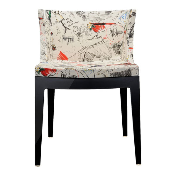Cream fabric chair with abstract multicolor patterns and black wooden legs. Stylish and modern design for any space.