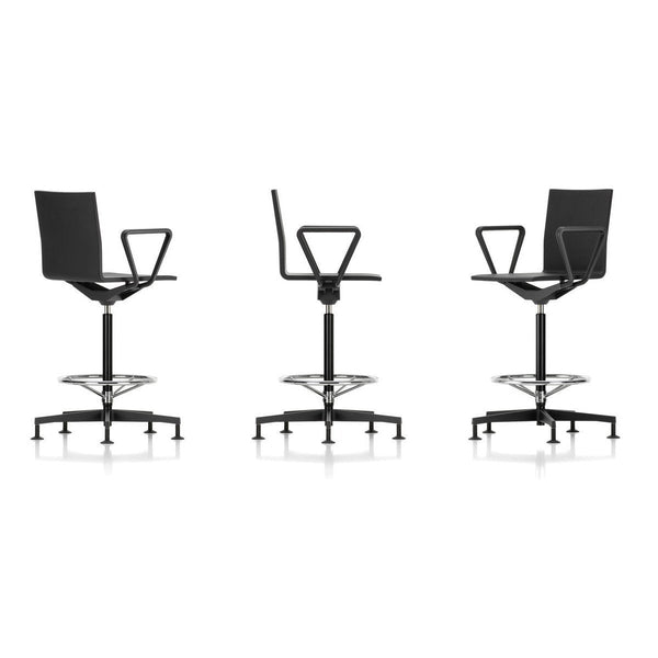 Modern black swivel stool with minimalist design and sleek chrome base, showcasing a contemporary and stylish aesthetic.