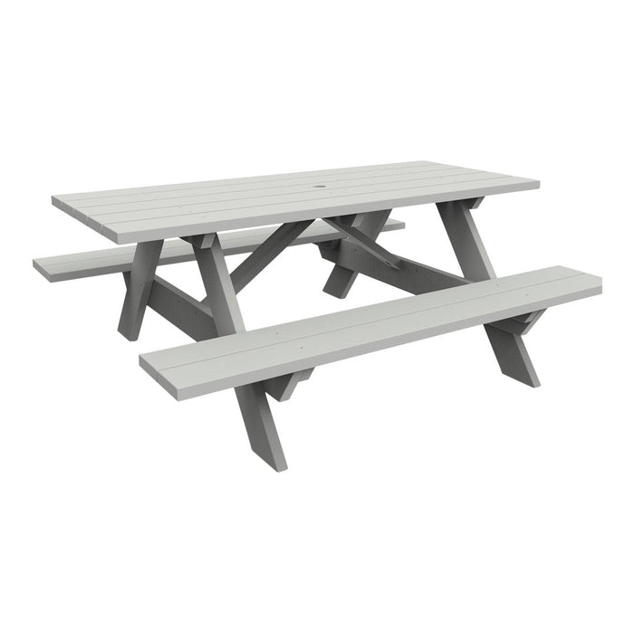 Gray picnic table with a sleek, slatted pattern and sturdy, angular legs for outdoor use.