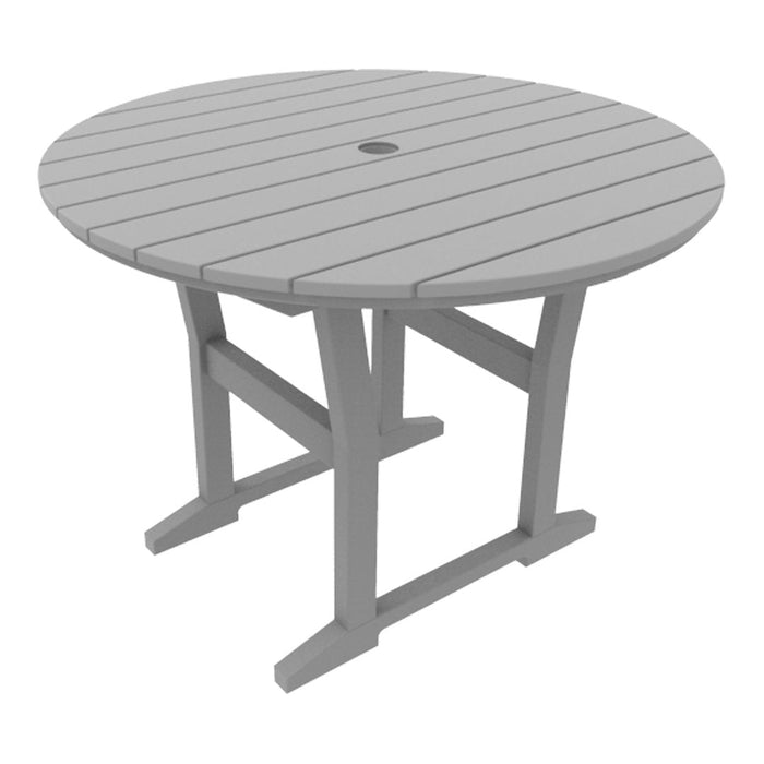 Gray round outdoor table with a slatted top and sturdy, angled legs, designed for durability and style.