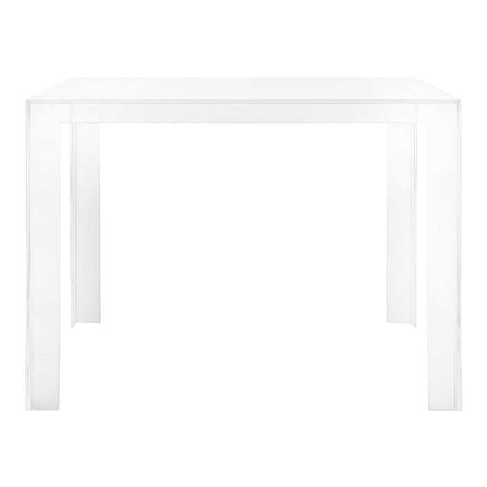 Clear acrylic table with a sleek, modern design, featuring a smooth, transparent finish and minimalist style.
