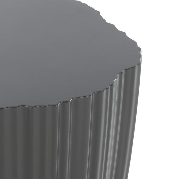 Gray ribbed side table with a scalloped edge, featuring a glossy finish and modern, sleek design.