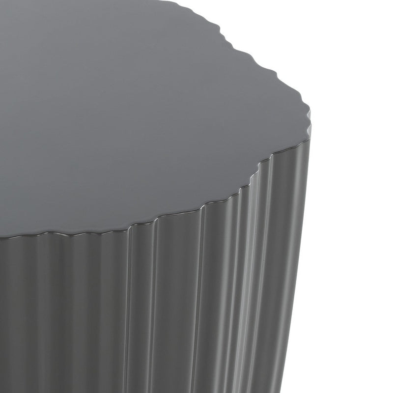 Gray ribbed side table with a scalloped edge, featuring a glossy finish and modern, sleek design.