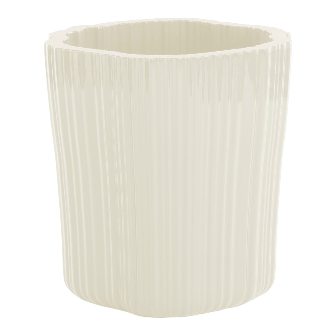 Creamy white textured planter with vertical ribbed pattern, perfect for modern decor.