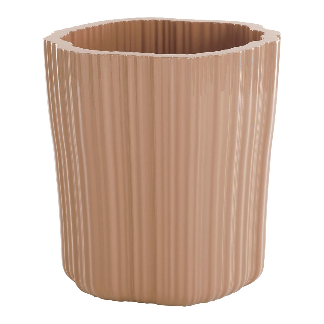 Pale pink ribbed planter with a unique scalloped top edge, ideal for modern decor and indoor gardening.