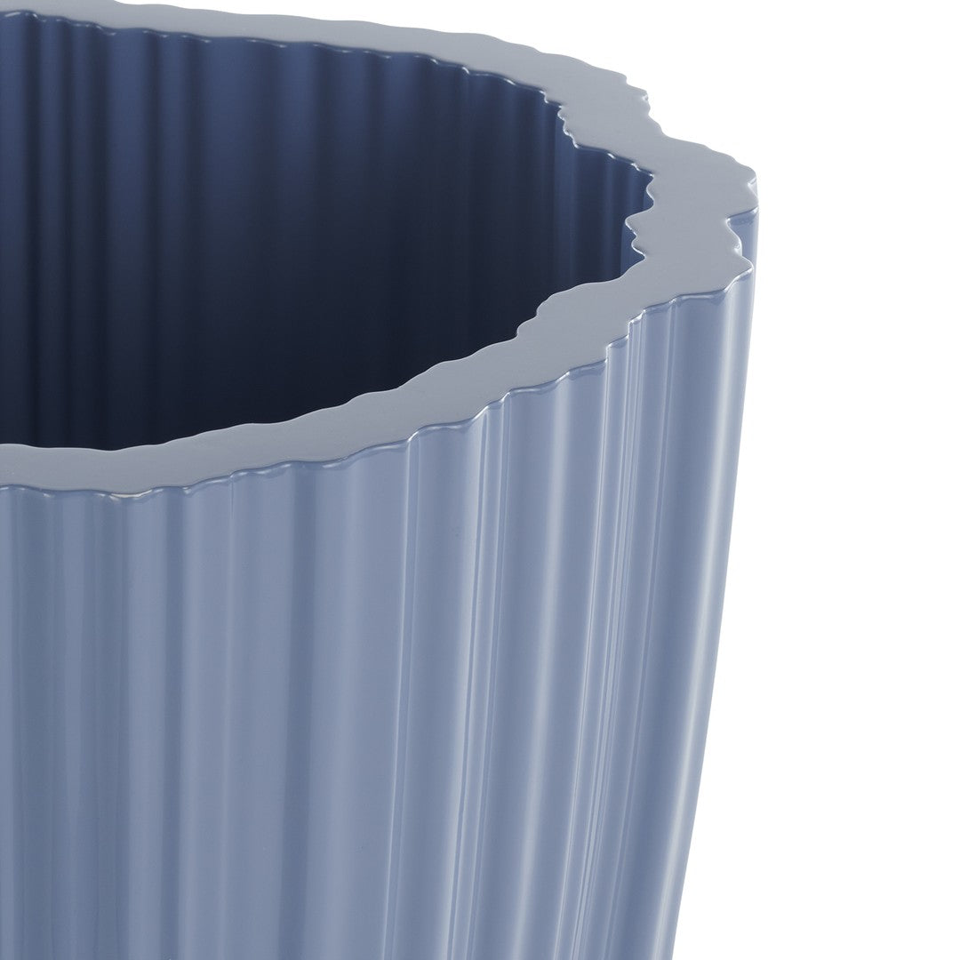"Rippled blue vase with a textured finish and irregular, wavy rim design."